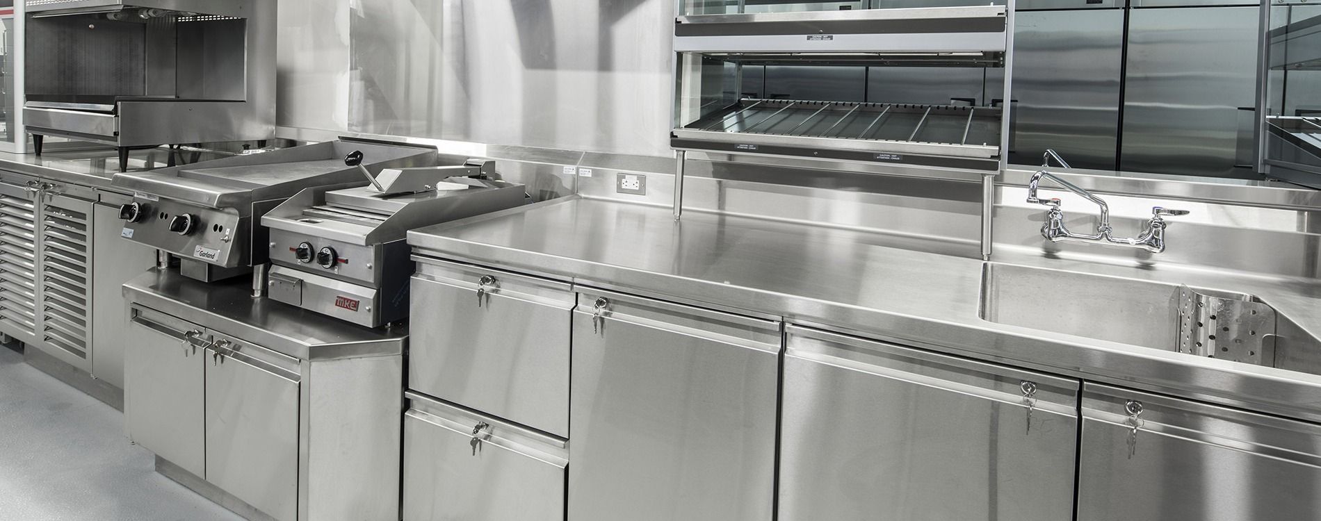 Stainless Steel Commercial Kitchen With Cooking Utensil — Central Coast Commercial Kitchen Cleaning in Tuggerah, NSW