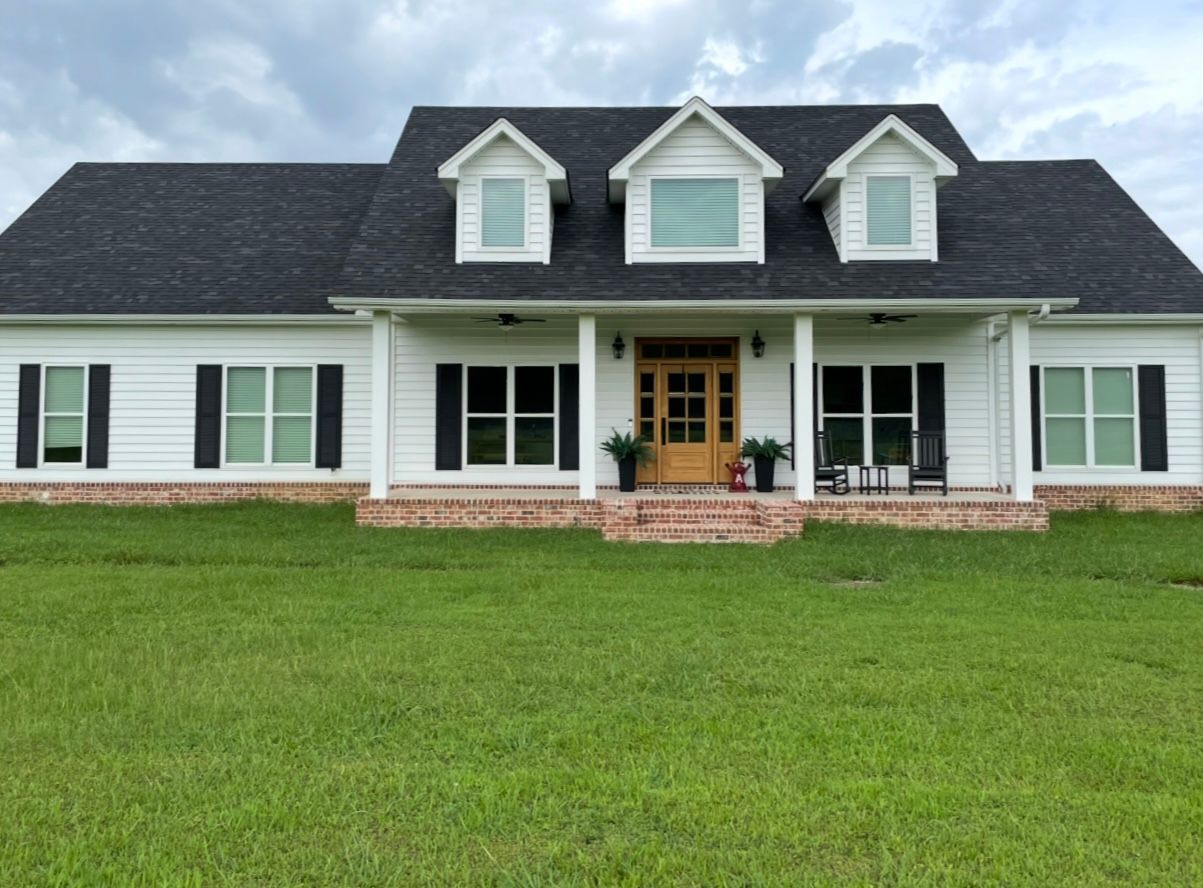 A newly built white, custom home.