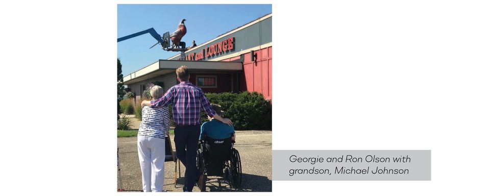 Georgie and Ron Olson with grandson Michael Johnson