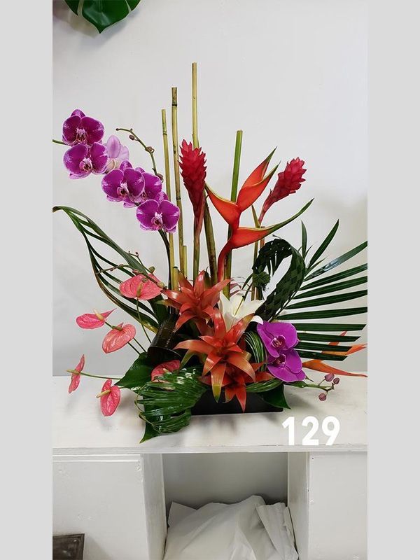 A bouquet of flowers with the number 129 on it