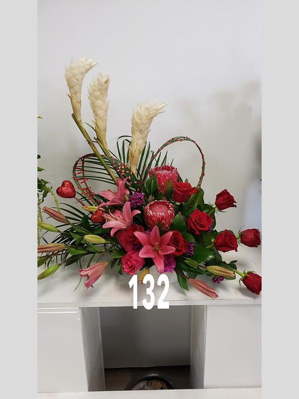 A bouquet of flowers with the number 132 on it
