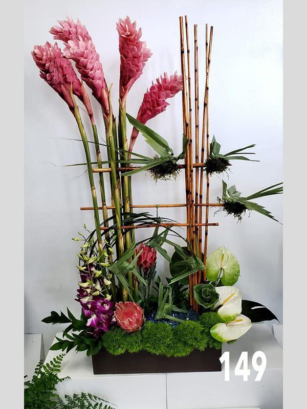 A flower arrangement with the number 149 on it