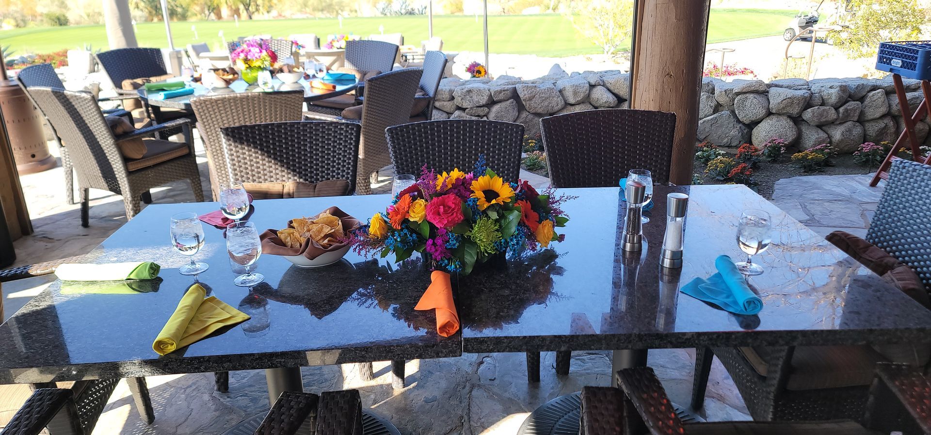 A table with a vase of flowers on it