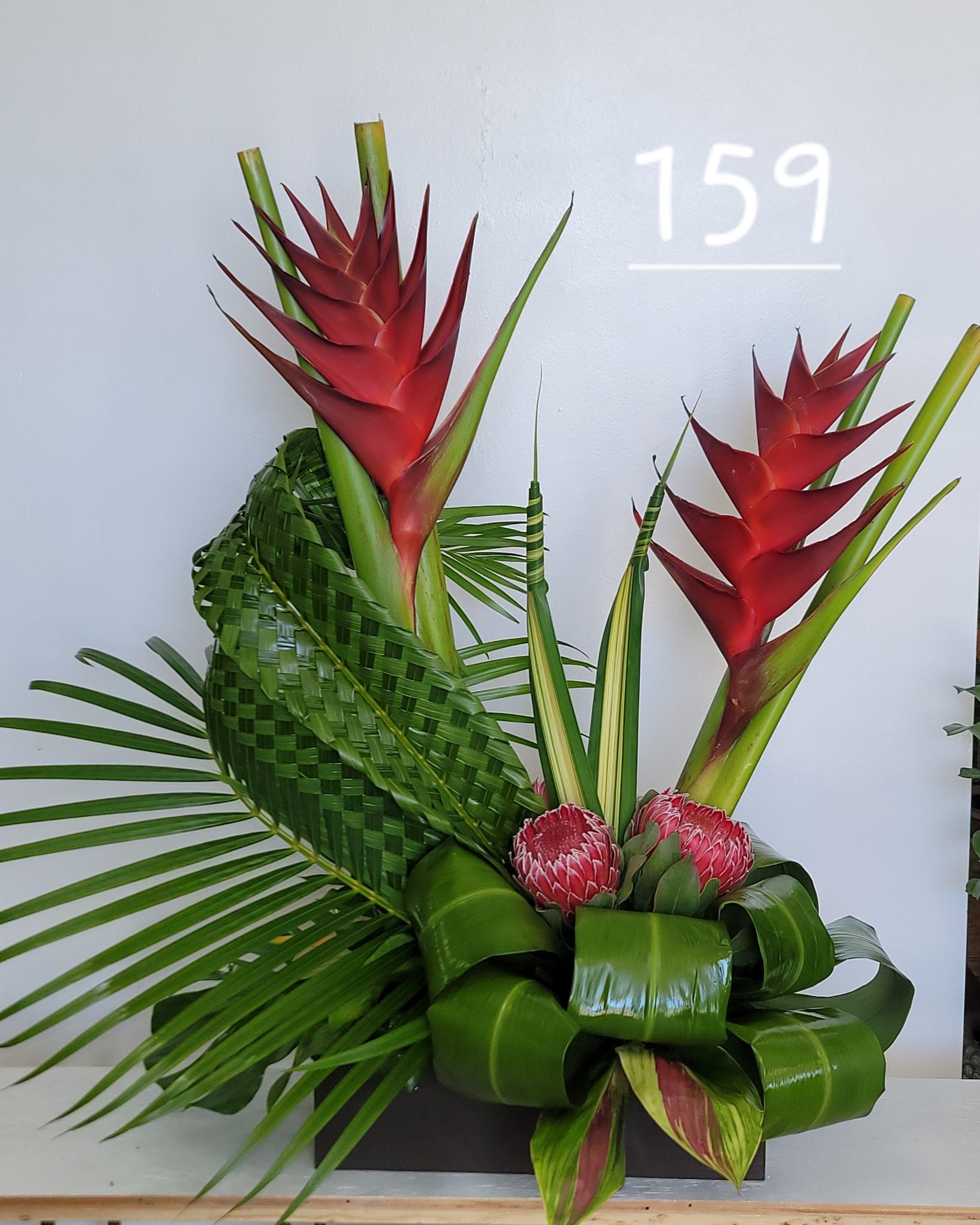 A bouquet of flowers with the number 159 on the bottom