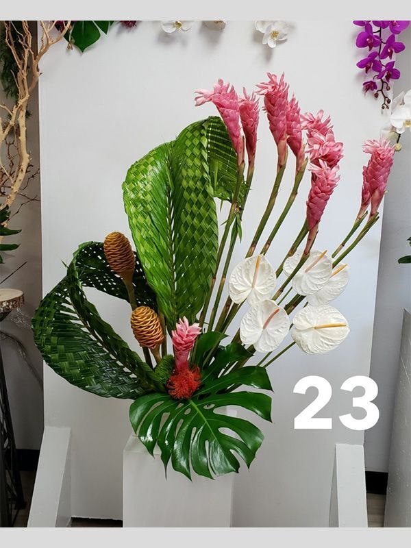 A bouquet of flowers with the number 23 next to it