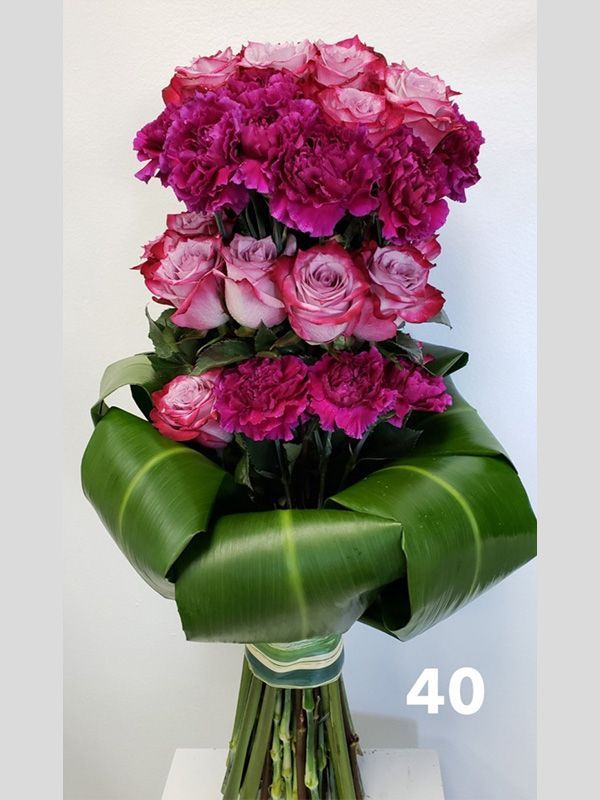 A bouquet of pink and purple flowers with the number 40 on the bottom