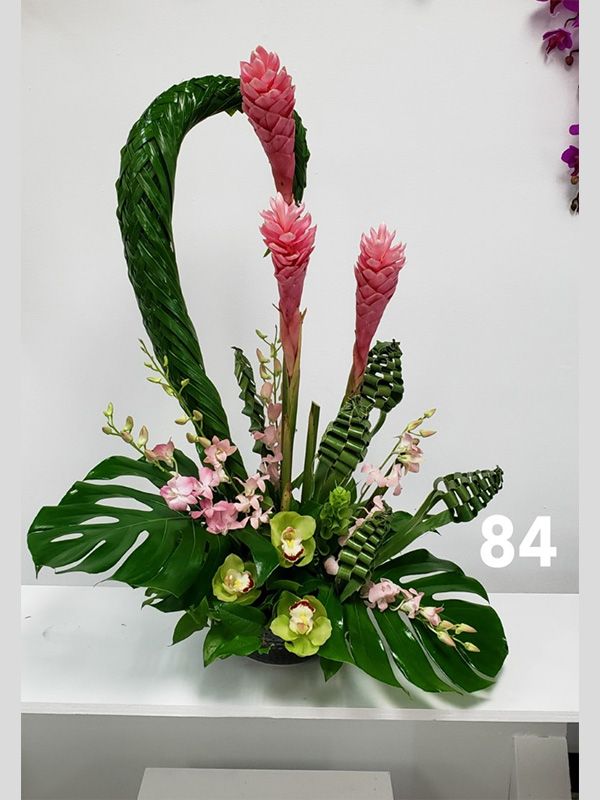 A bouquet of flowers with the number 84 on the bottom