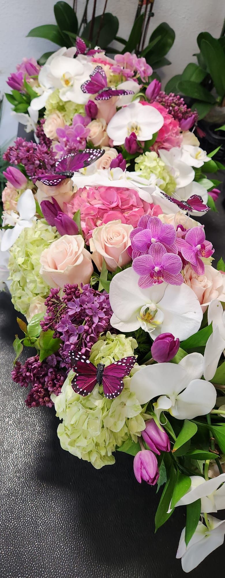 A bunch of flowers are sitting on a table.