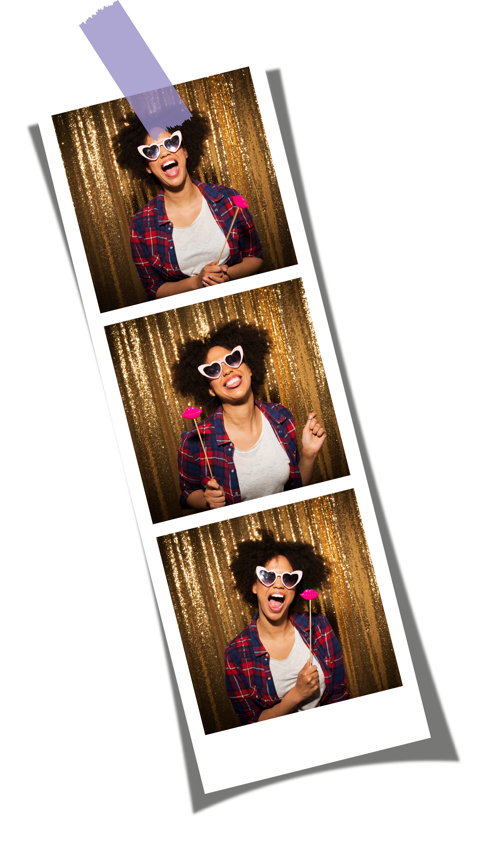 A woman wearing sunglasses is standing in front of a gold curtain in a photo booth.