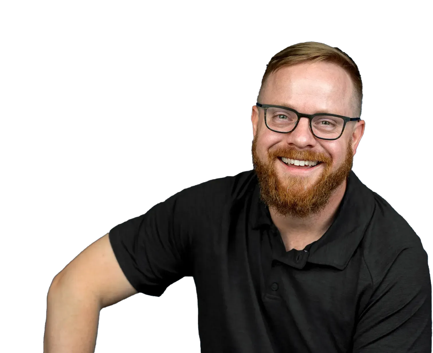 A man in a white shirt is standing in a room.