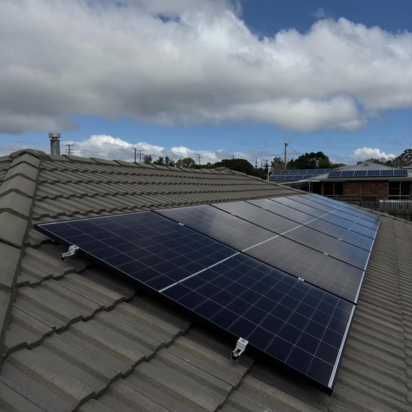 A Gray Roof with Solar Panels Installed on It — Solar Blessing in Stanthorpe, QLD