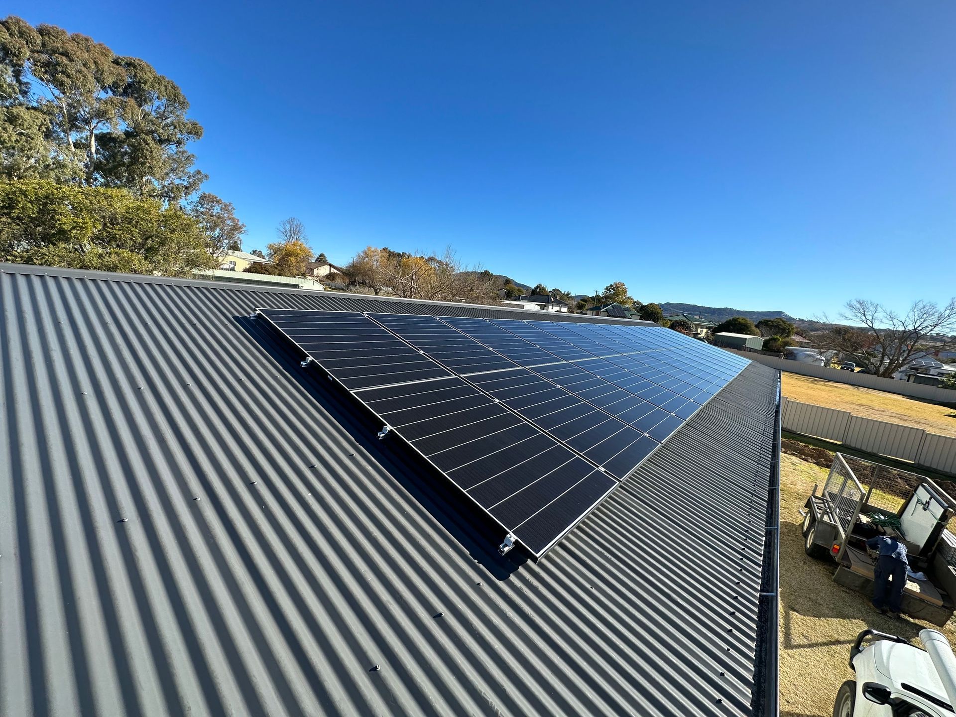 A Row of Solar Panels Installed on Top of A Metal Roof — Solar Blessing in Stanthorpe, QLD