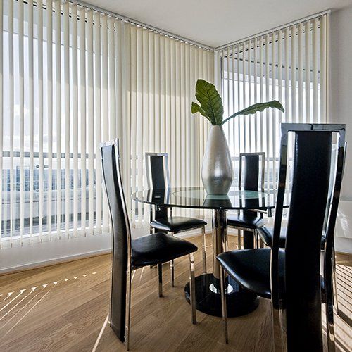 White Vertical Blinds in Apartment Dining Room — Austin, TX — Installation-Nation