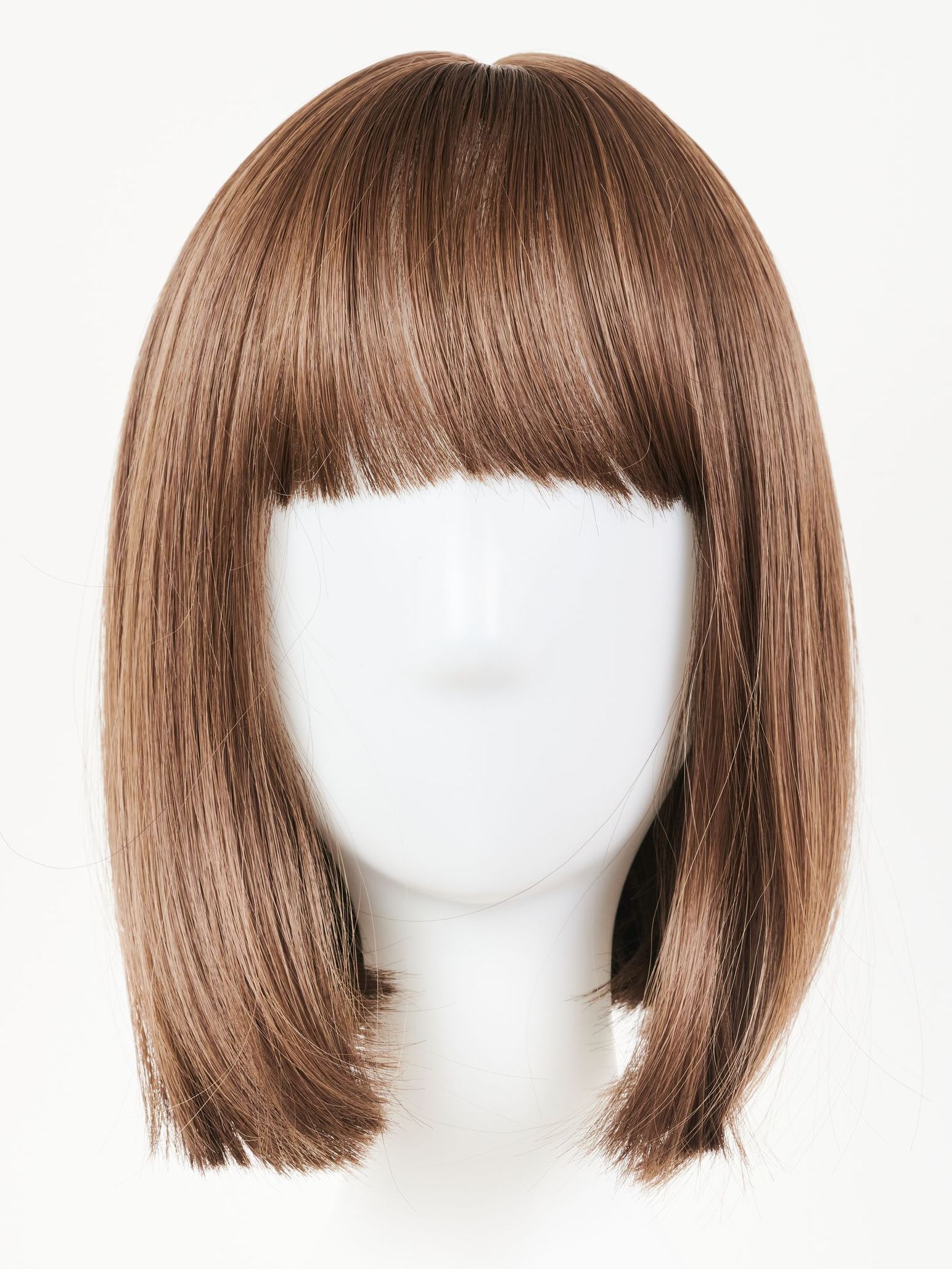 a wig with bangs is on a mannequin head