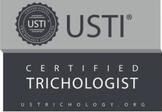 USTI certified trichologist badge