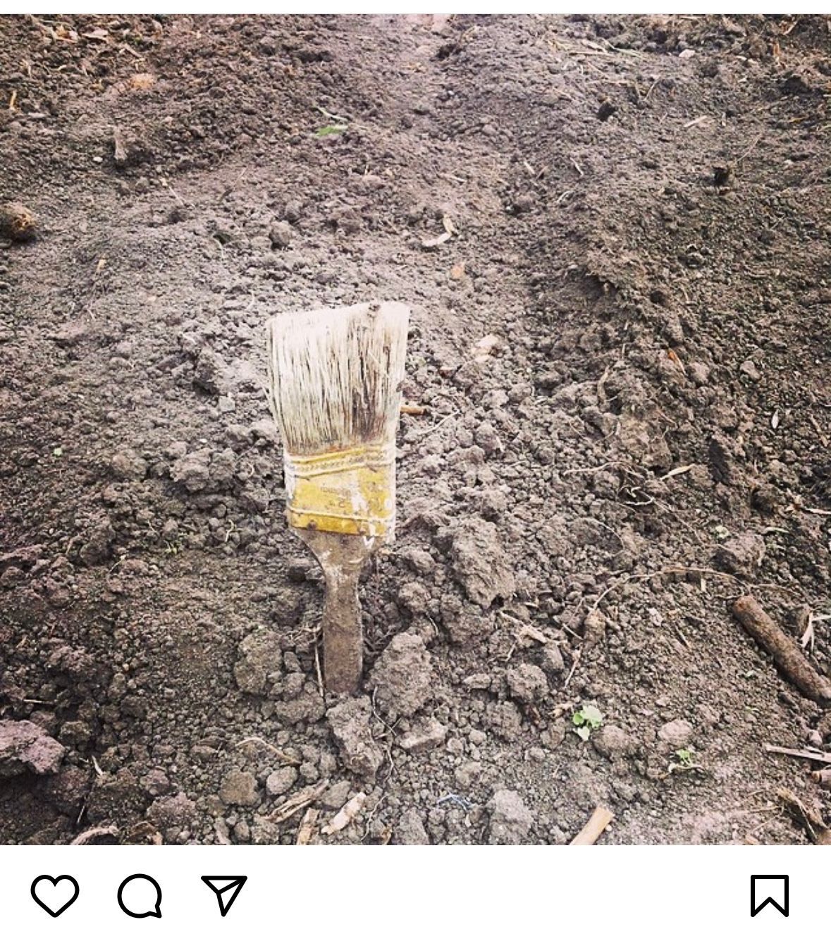 Paint Brush in the farm dirt. Instagram picture and share