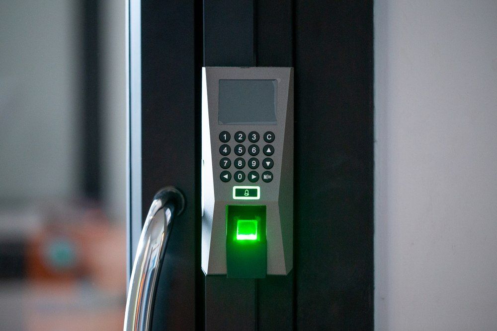 Fingerprint Scanner and Keypad on a Black Door — X-Mod Security In Landsborough, QLD