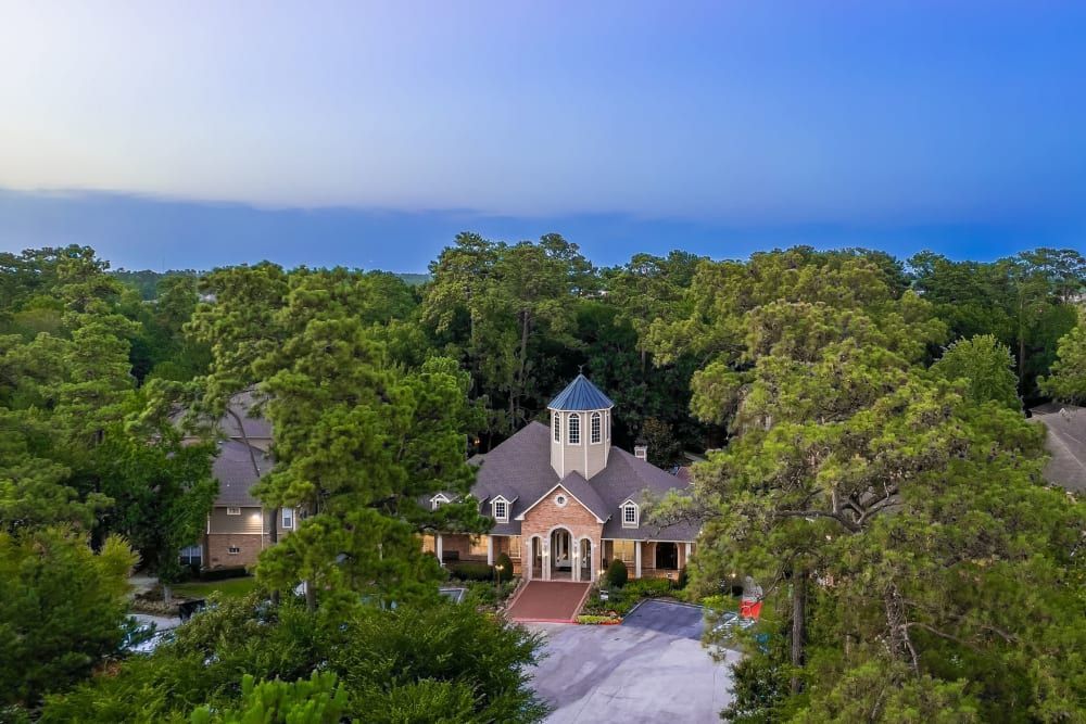 an aerial view surrounded by trees at Marquis at Kingwood in Kingwood, TX.