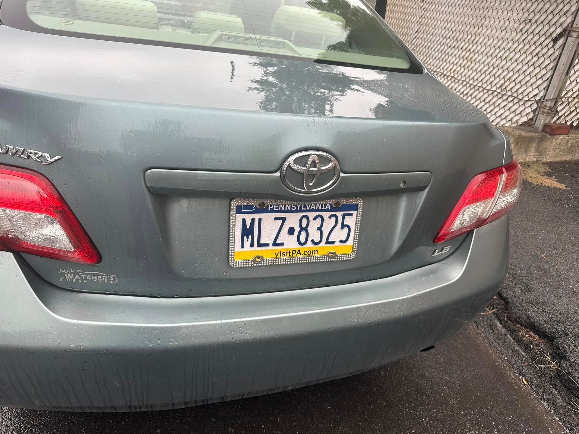 A toyota camry with a license plate that says mlz 8325