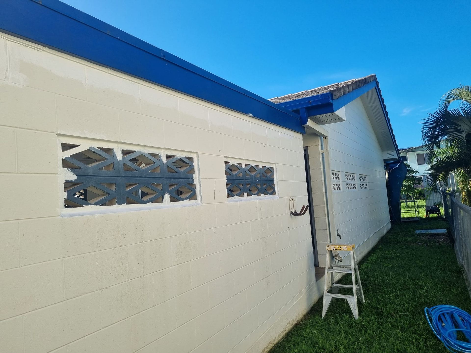 Exterior of a Light Beige Building With Dark Blue Trim — Israel Jones Painting in Castle Hill, QLD