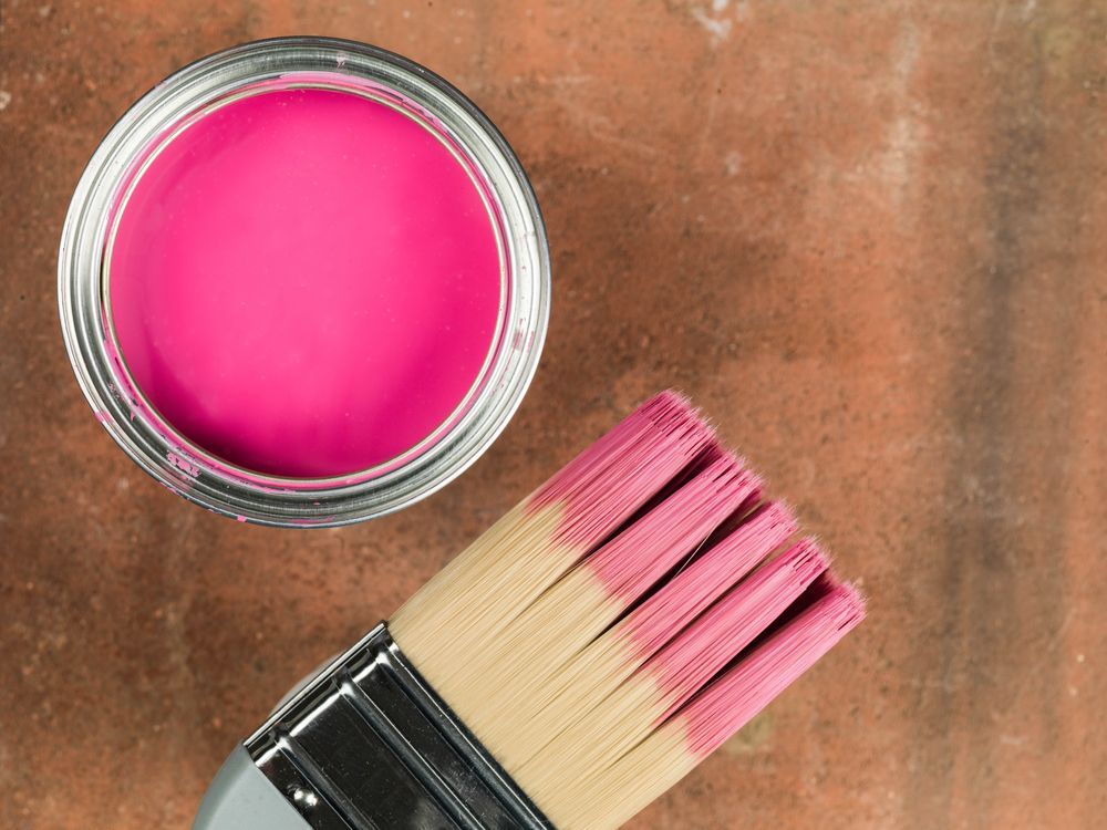 Open Can of Pink Paint and Paintbrush — Israel Jones Painting in Vincent, QLD