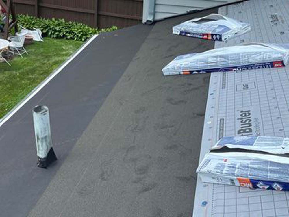 A roof with a bunch of boxes on it