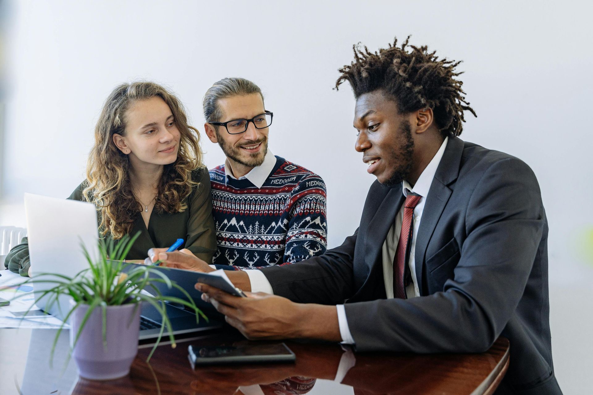 A couple working with a financial advisor.