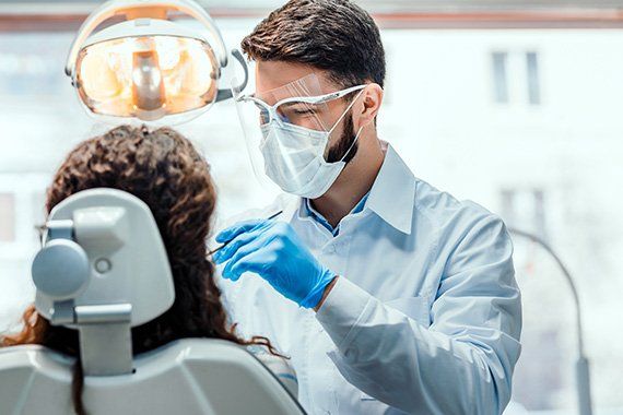 Dentist Checking the Patient's Teeth — Bridgeport, WV — Grubler Dentistry