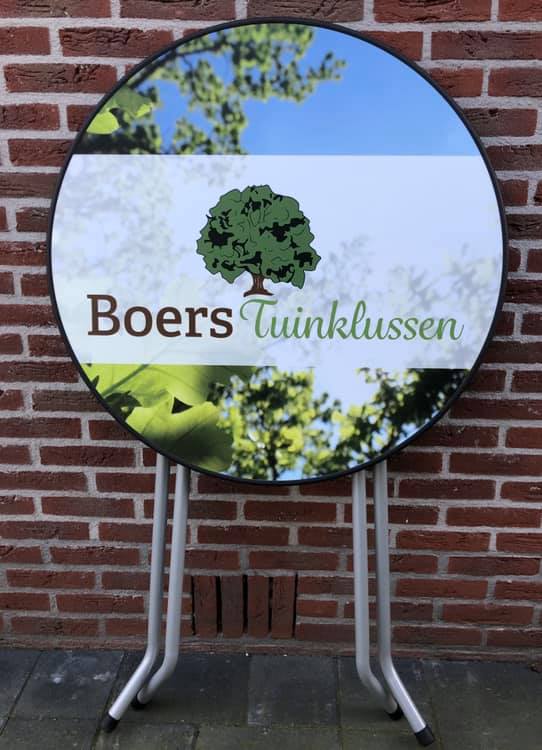Boers Tuinklussen sta tafel met logo