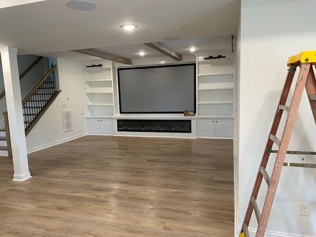There is a ladder in the middle of the room.