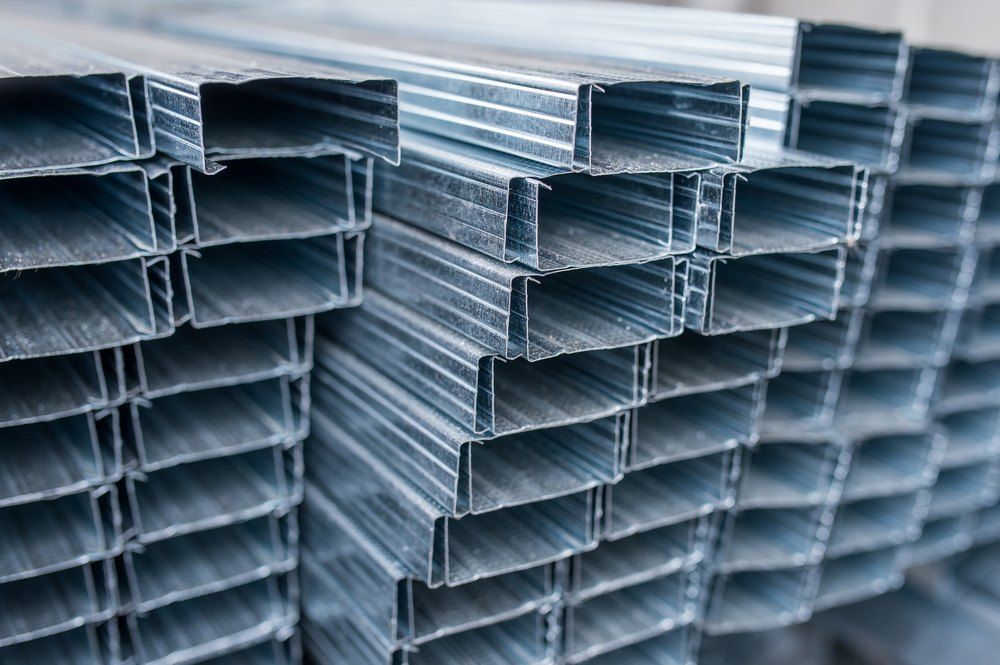 Neatly Stacked Galvanized Steel Framing Channels — AWE Engineering in South Lismore, NSW