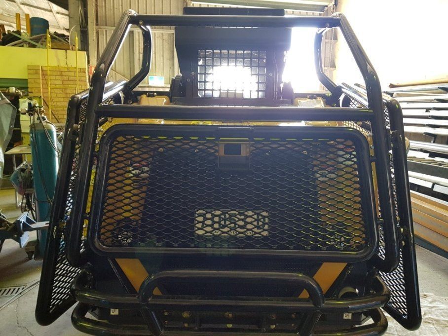 A Close Up of a Black and Yellow Vehicle in a Garage — AWE Engineering in South Lismore, NSW