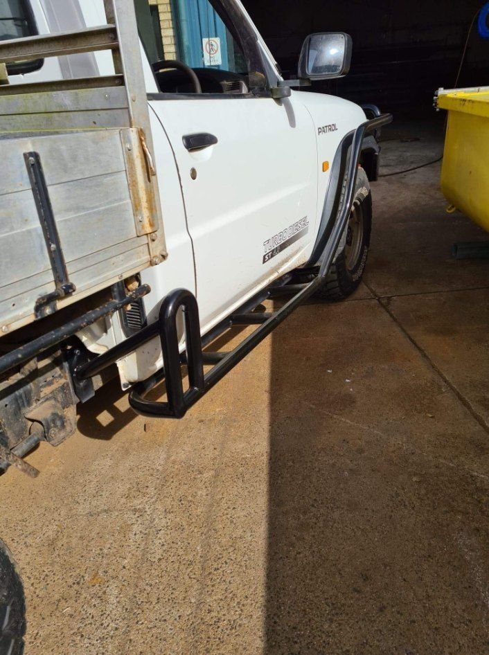 There is a Truck That is Parked on the Side of the Road — AWE Engineering in South Lismore, NSW