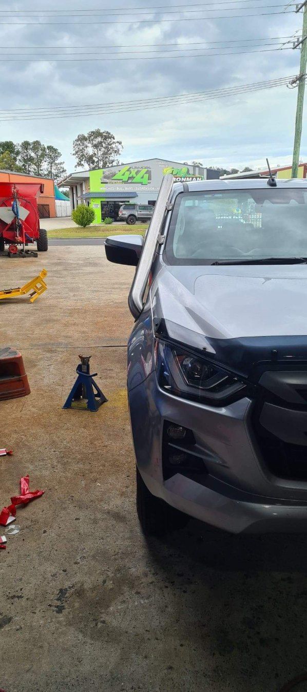 Araffe Standing on a Step Next to a Car With a Jacket — AWE Engineering in South Lismore, NSW