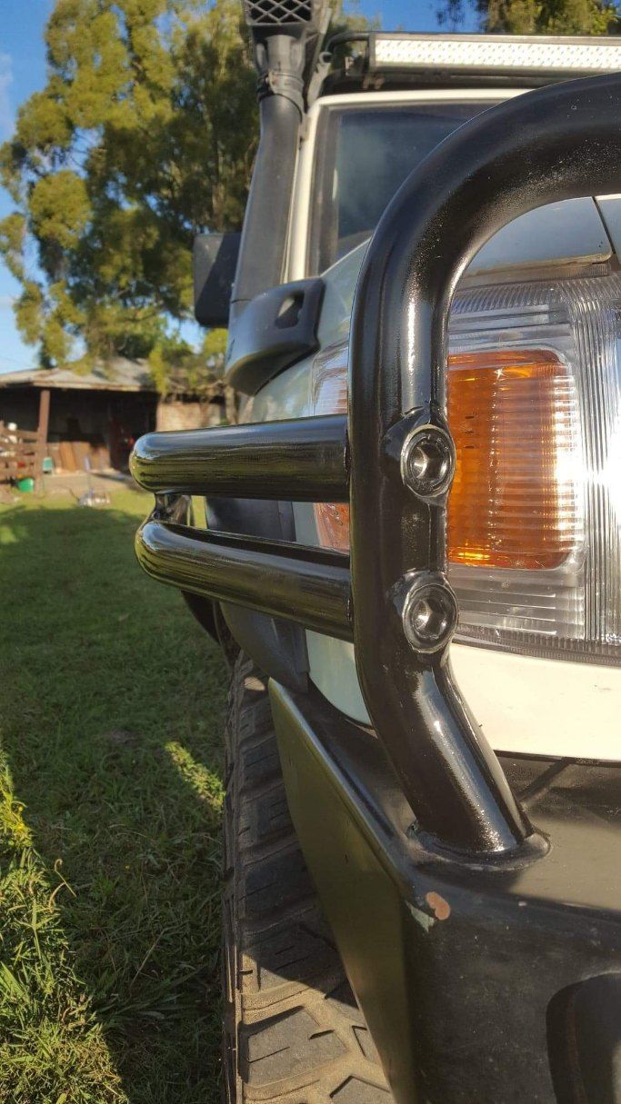 Close-up of a black bull bar mounted on a vehicle — AWE Engineering in South Lismore, NSW