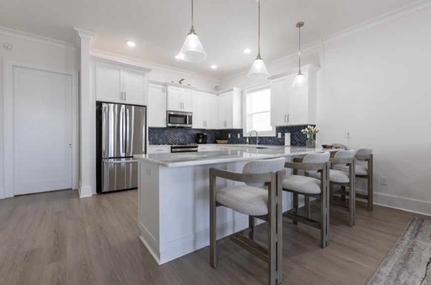 Spacious open concept living room with extra large eat at bar at Rest Ashore rental in Gulf Shores Alabama