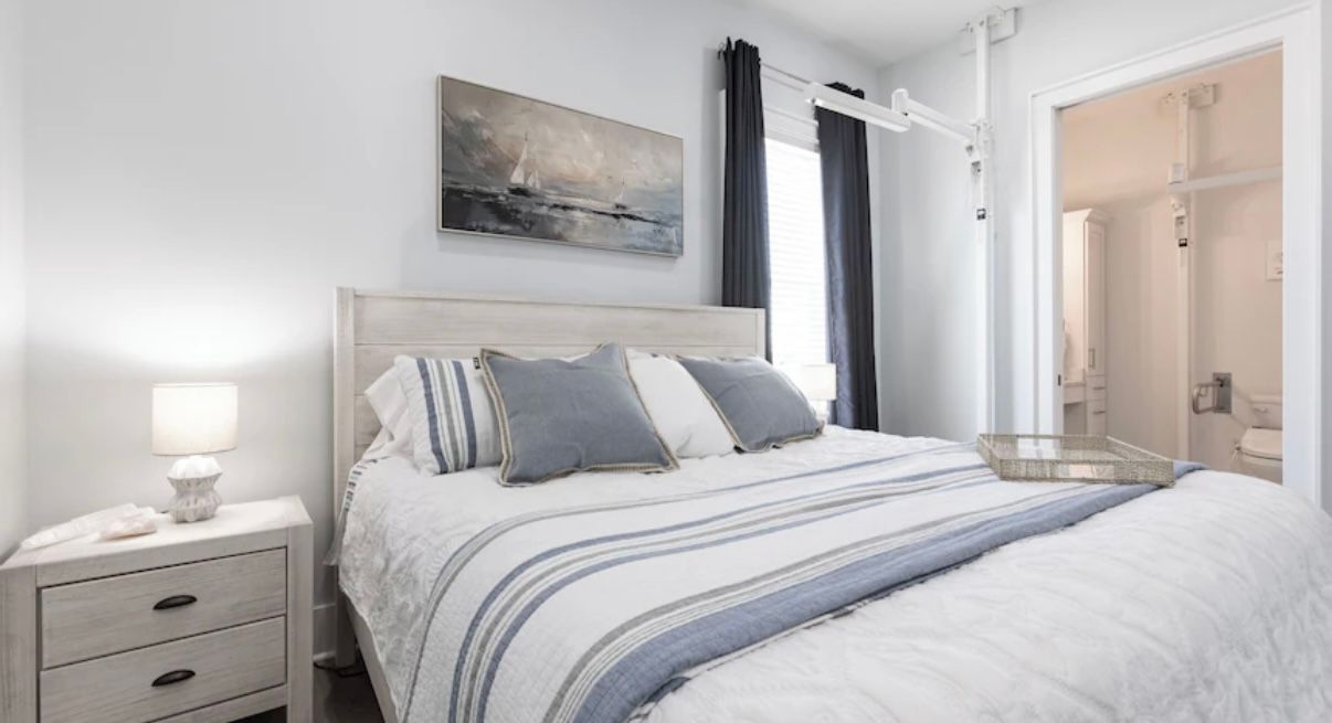 Luxurious Handicap accessible king size master with built in Patient lift for easy transfers at Rest Ashore in Gulf Shores