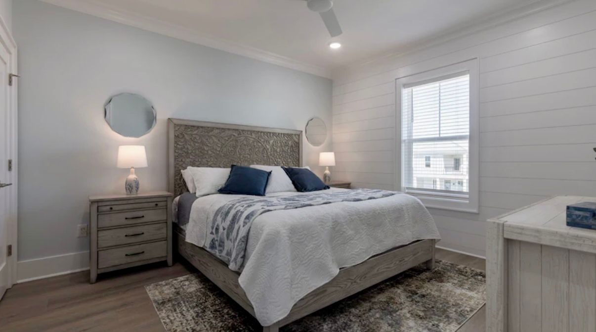 upstairs king size bedroom with private  tile shower en-suite at Rest Ashore in Gulf Shores, Alabama