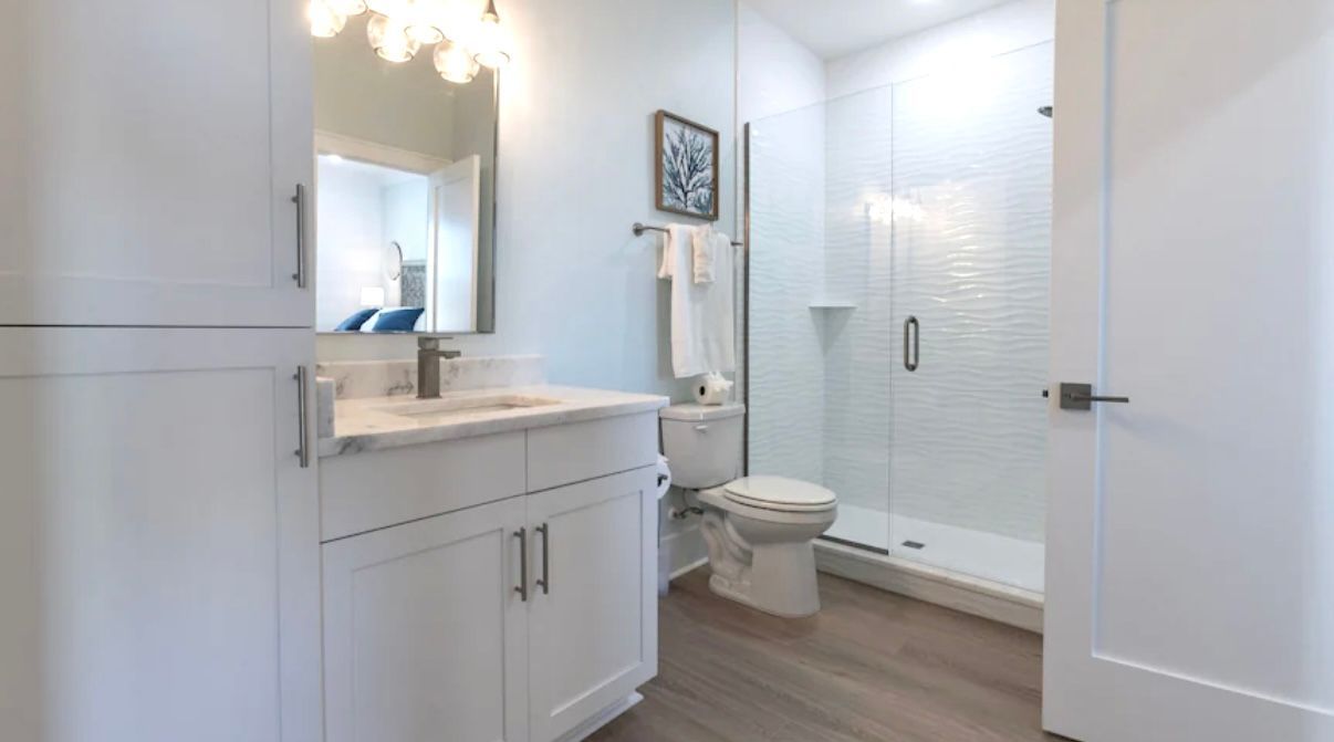 Private Bath with tile shower adjoining upstairs King size bedroom at rest Ashore in Gulf Shores, Alabama