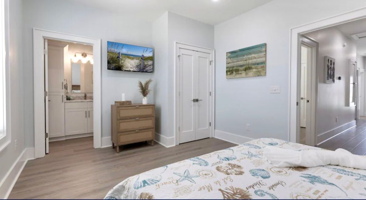 Queen size bedroom with Private Tile shower en-suite at Rest Ashore in Gulf Shores, Alabama