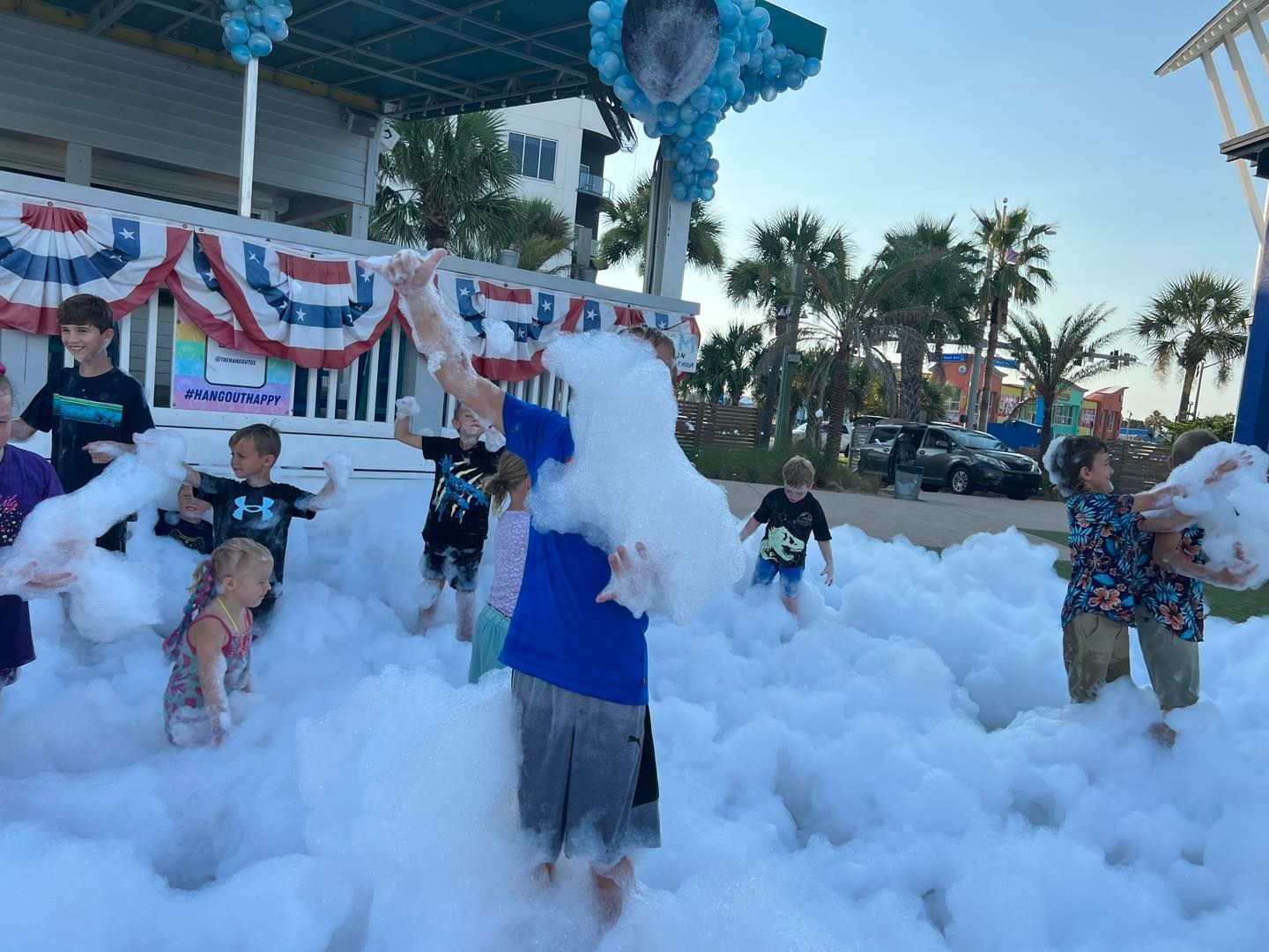 Children playing at the foam party at the Hang out Restaurant in Gulf Shores, Alabama