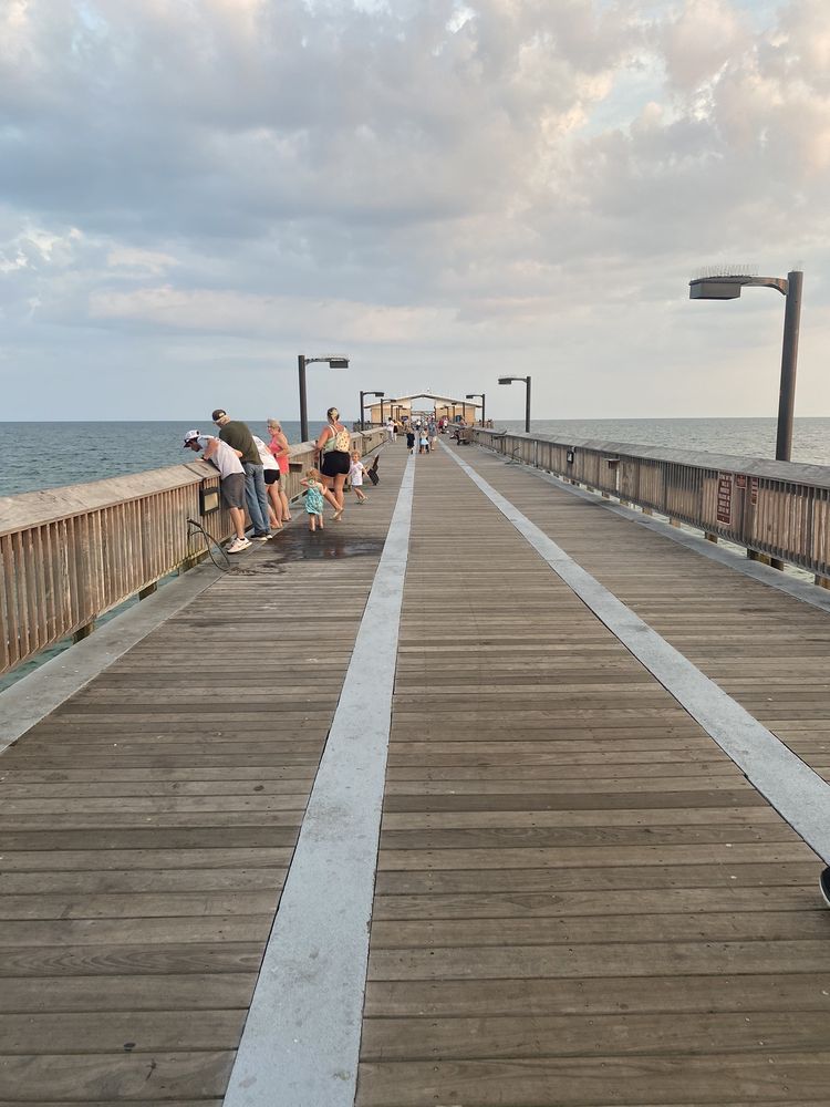 Fishermen and visitors alike, enjoy the beautiful sights from Gulf Shores Pier.