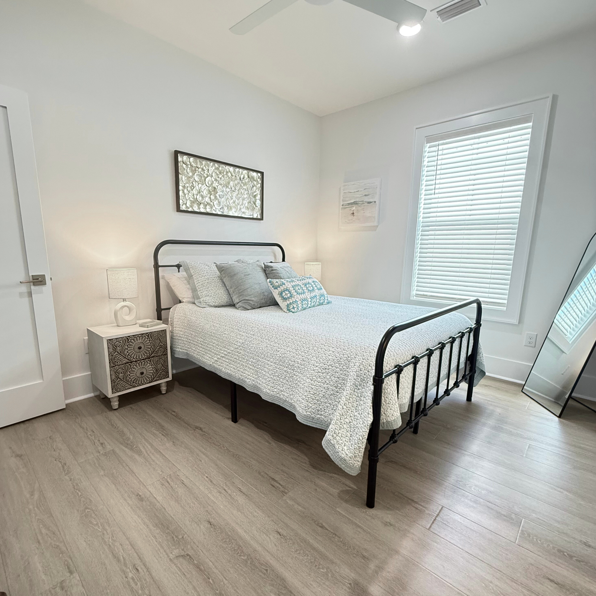 upstairs queen bedroom with private tub/shower combo at Rest Ashore in Gulf Shores, Alabama