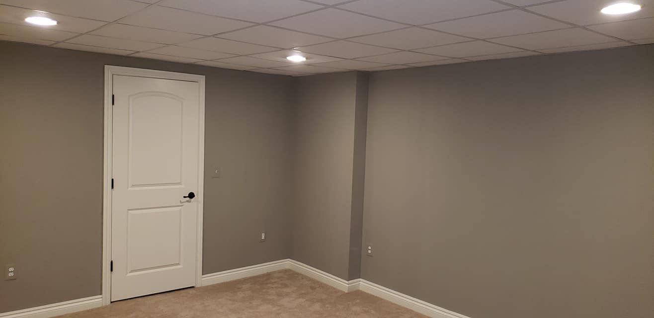 There is a door in the corner of the room.