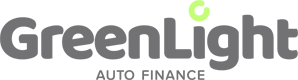 The logo for greenlight auto finance is gray and green.