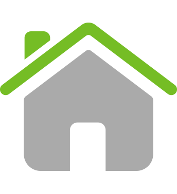 A gray house with a green roof and chimney.