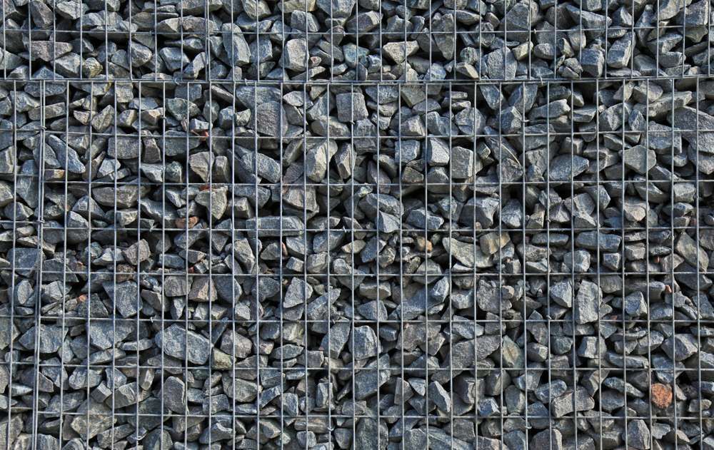 A Close Up Of A Wire Fence Filled With Rocks — HKL Landscape Supplies in Hallidays Point, NSW