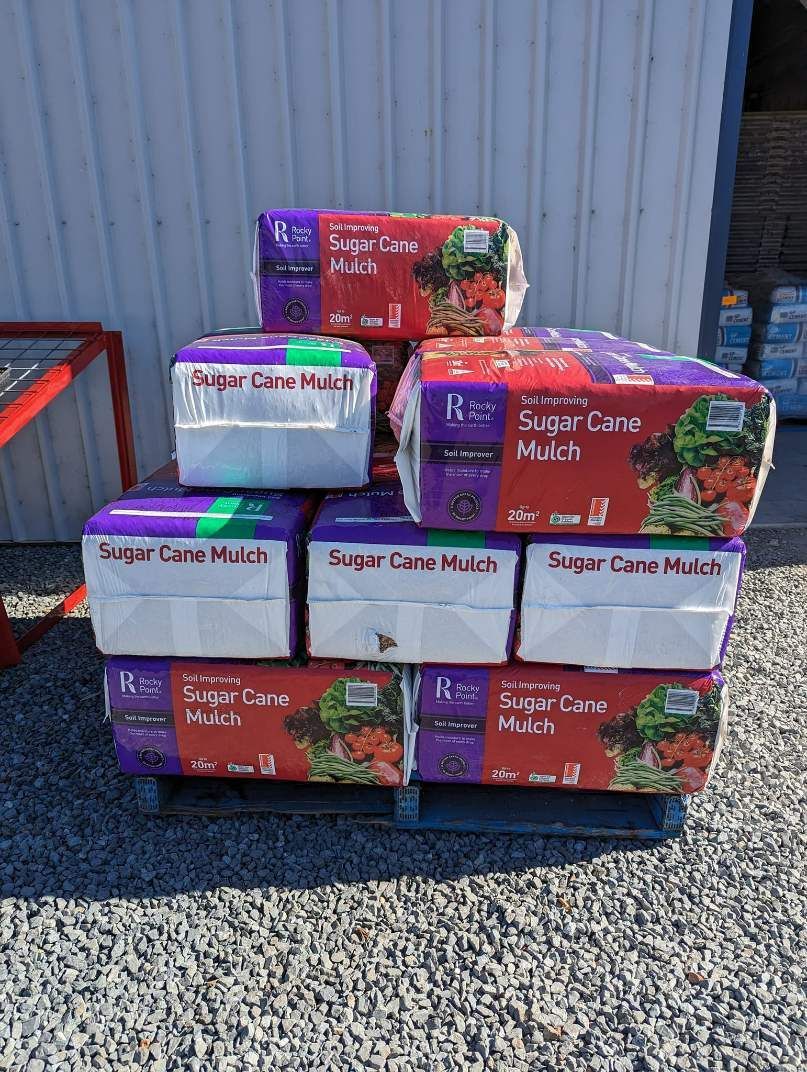 A Pile of Sugar Cane Stacked on Top of Each Other on a Pallet — HKL Landscape Supplies in Gloucester, NSW