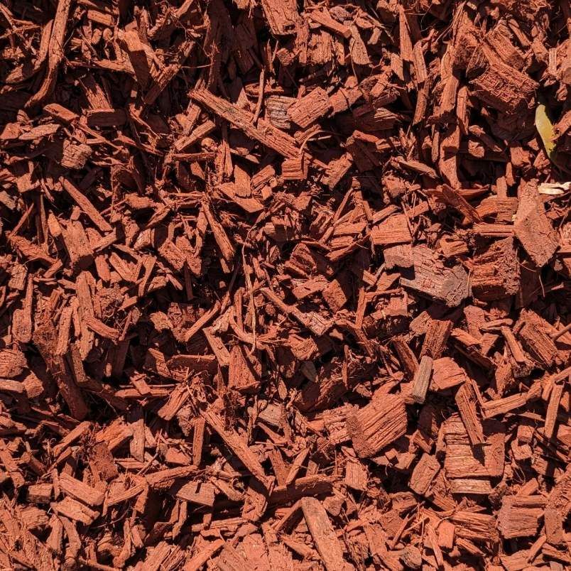 A Pile Of Brown Mulch Is Sitting On The Ground — HKL Landscape Supplies in Taree South, NSW