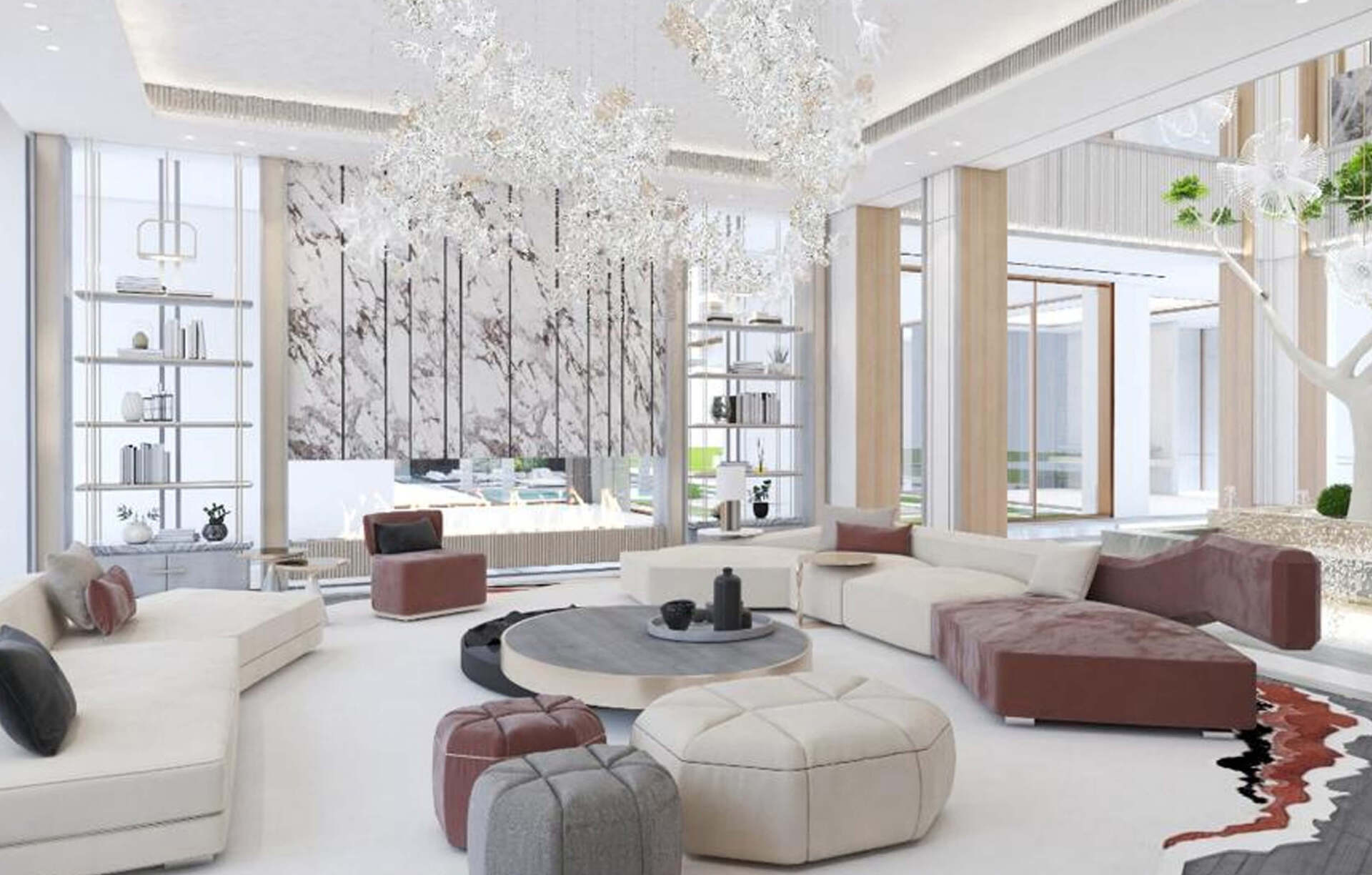 Elegant modern living room with curved sofas, ottomans, and large crystal chandeliers.